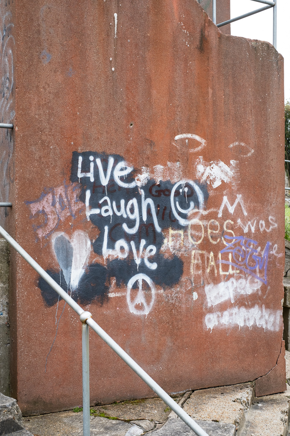 'Live, Laugh, Love' graffiti on the Battery Observation Post, nicknamed 'the Doll's House', Beacon Hill Fort, Harwich, Essex, UK